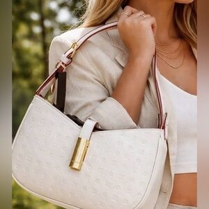 Elegant White Shoulder Bag with Gold Accent